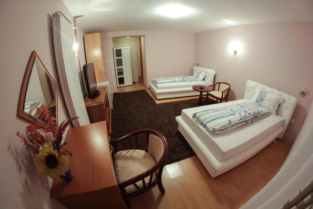Postel nebo postele na pokoji v ubytování Hotel Fontana