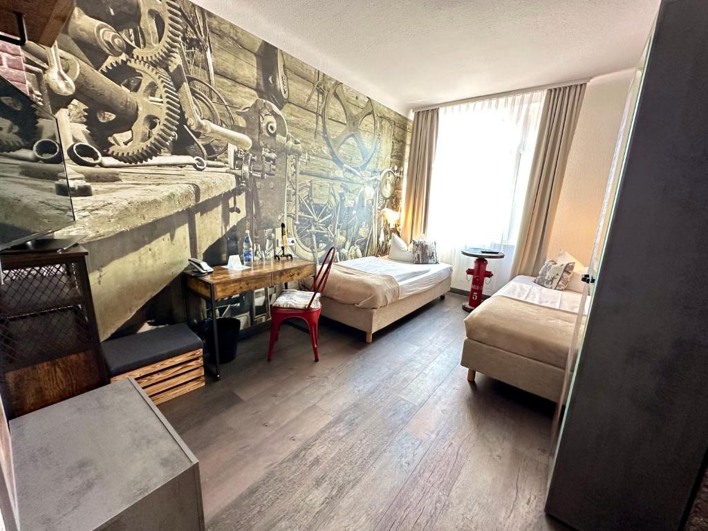 Postel nebo postele na pokoji v ubytování Hotel "Central" Inh Carolin Krause
