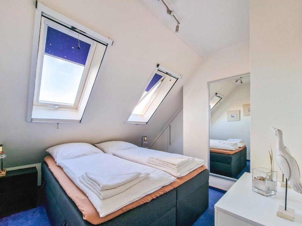 Postel nebo postele na pokoji v ubytování Nimo 2