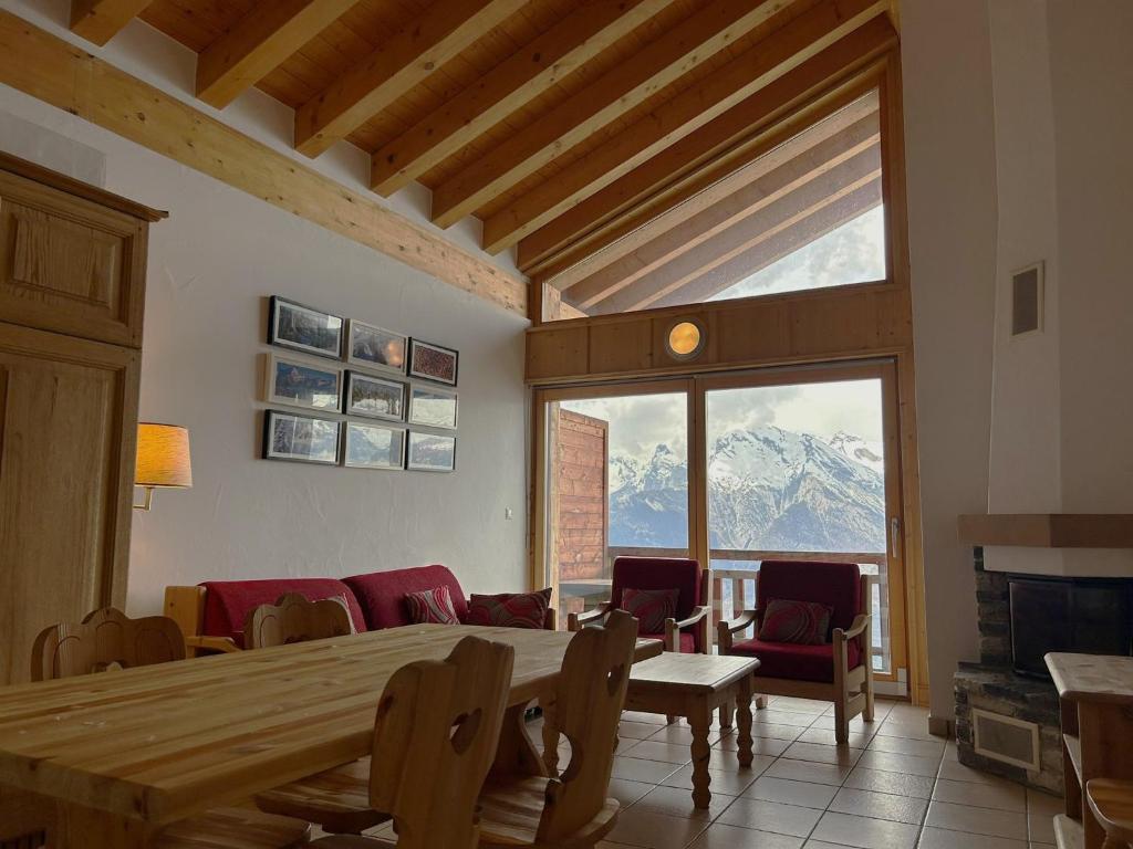 Posezení v ubytování Plein Ciel MOUNTAIN & COSY apartments by Alpvision Résidences