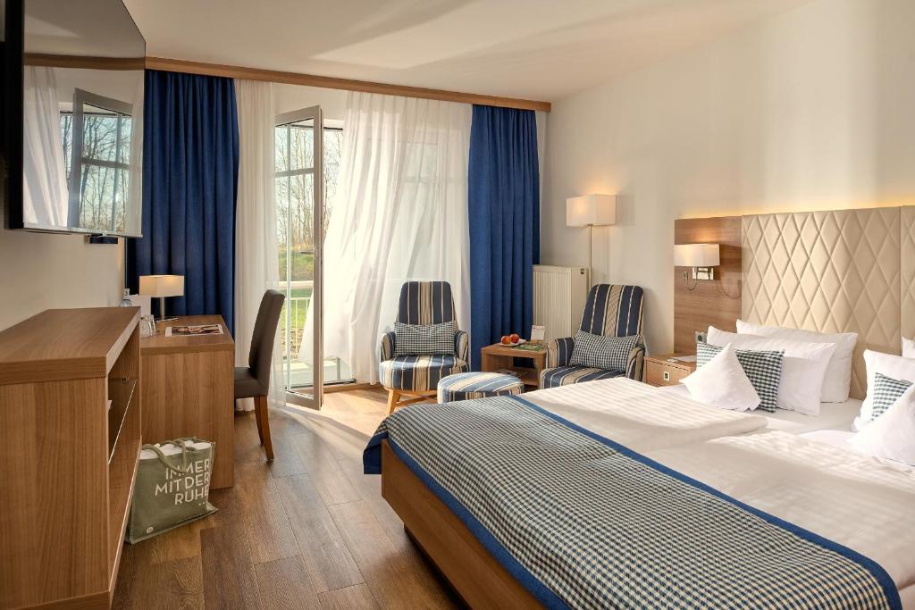 Postel nebo postele na pokoji v ubytování Hotel Bernstein