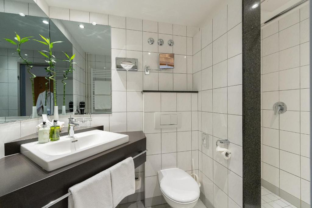 Koupelna v ubytování Hotel Bernstein