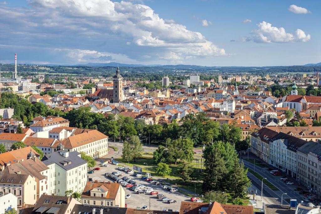 an aerial view of a city with buildings and cars at Clarion Congress Hotel České Budějovice in České Budějovice
