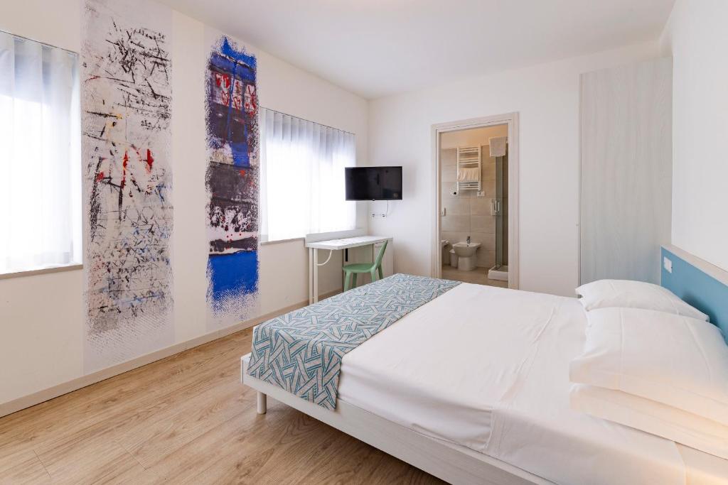 Postel nebo postele na pokoji v ubytování Art Hotel Principe