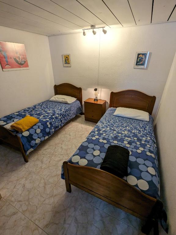 Postel nebo postele na pokoji v ubytování La Casa del Sol, Abades