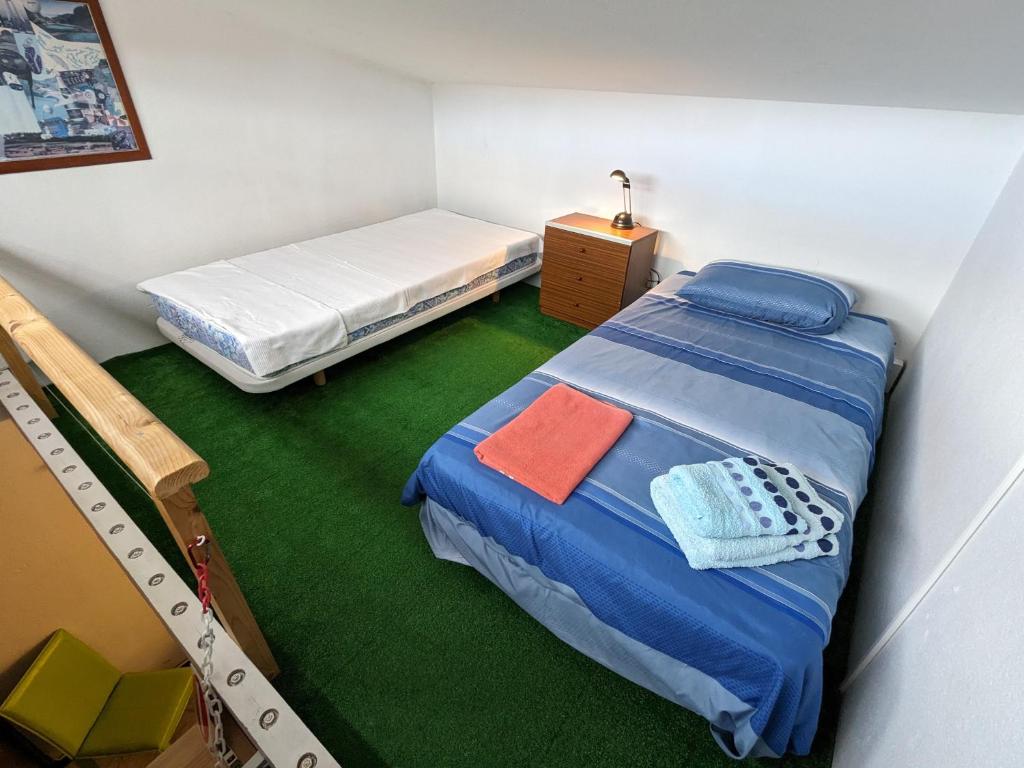 Postel nebo postele na pokoji v ubytování La Casa del Sol, Abades