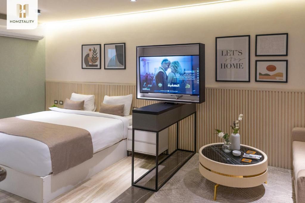 TV a/nebo společenská místnost v ubytování Homztality Elbatal Mohandeseen