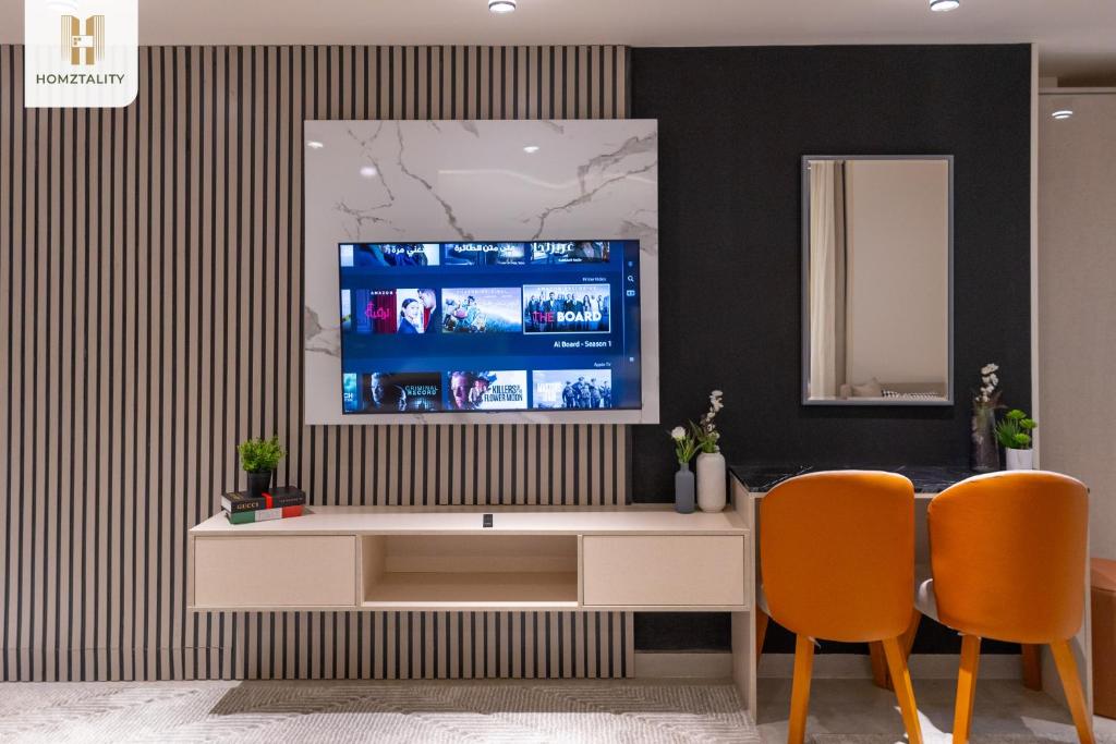 TV a/nebo společenská místnost v ubytování Homztality Elbatal Mohandeseen