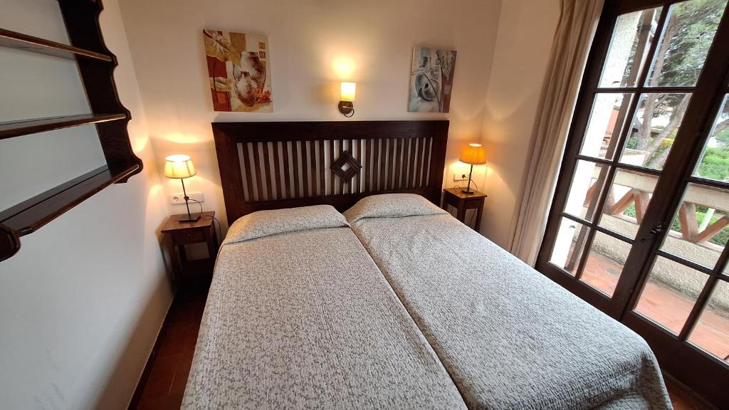 Posteľ alebo postele v izbe v ubytovaní Torre Vella 207