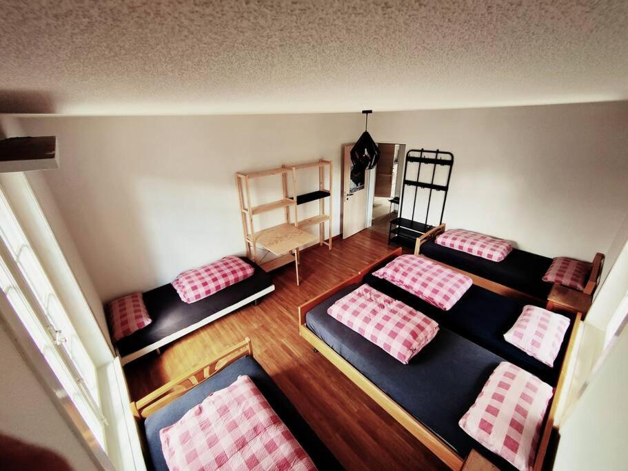 Postel nebo postele na pokoji v ubytování House of Thun Full Apartment
