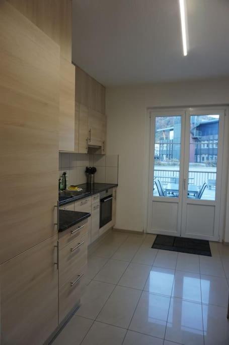 Kuchyň nebo kuchyňský kout v ubytování House of Thun Full Apartment