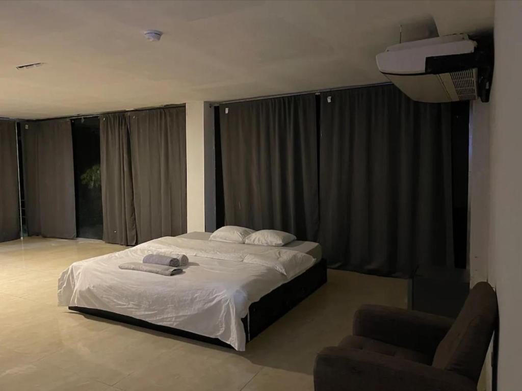 Letto o letti in una camera di Gorgona Beach House