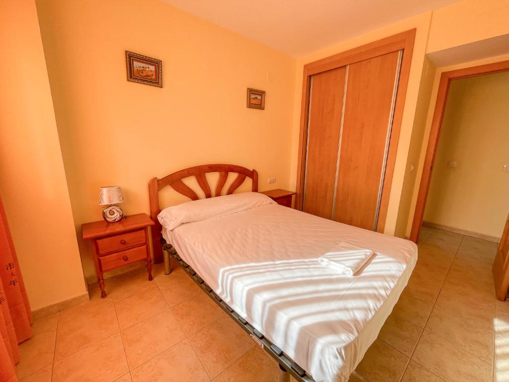 Postel nebo postele na pokoji v ubytování Oropesa Ciudad de Vacaciones 3000