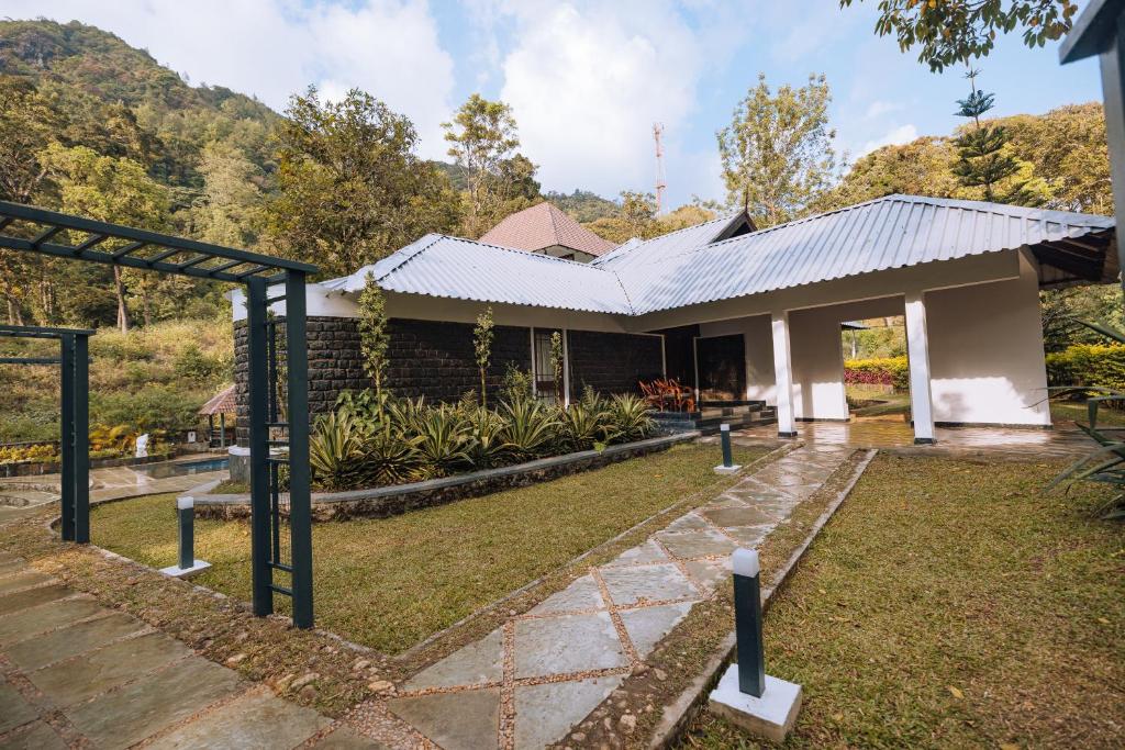 Zahrada ubytování Elixir Woods Luxury Resort And Spa, Munnar