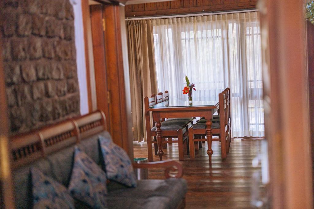 Posezení v ubytování Elixir Woods Luxury Resort And Spa, Munnar