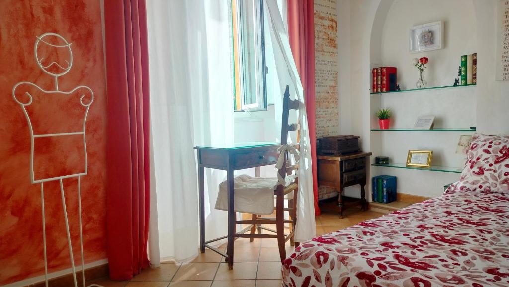Postel nebo postele na pokoji v ubytování B&B La Casa in Centro