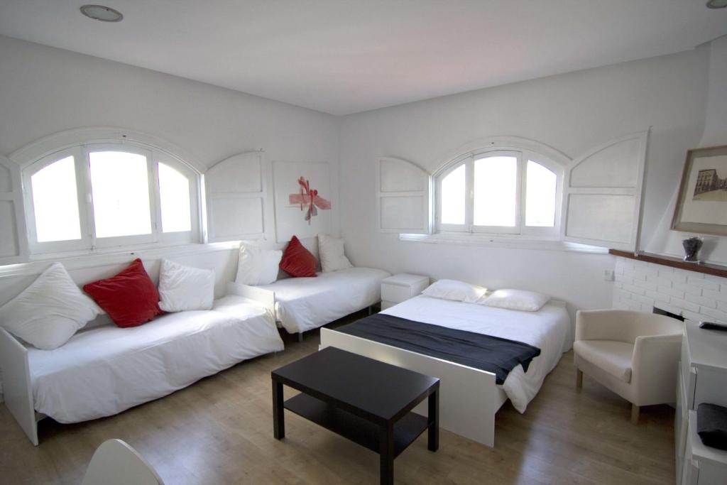 Postel nebo postele na pokoji v ubytování Torreon Sol Apartment