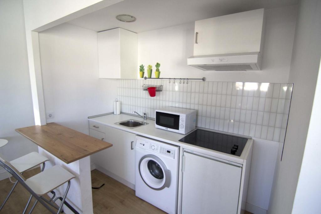 Kuchyň nebo kuchyňský kout v ubytování Torreon Sol Apartment