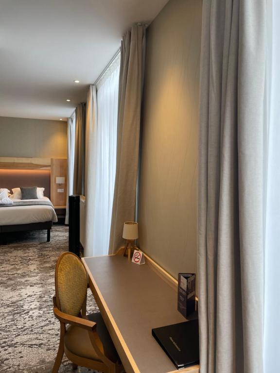 Postel nebo postele na pokoji v ubytování Hotel Le Cercle