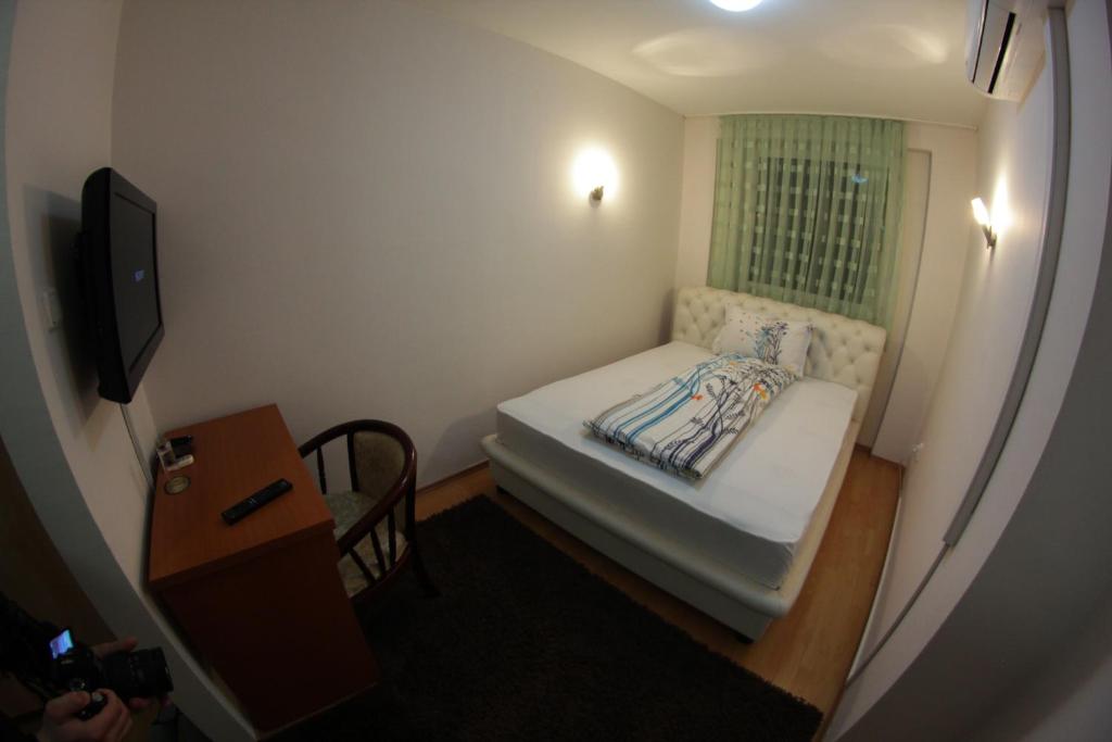 Postel nebo postele na pokoji v ubytování Hotel Fontana