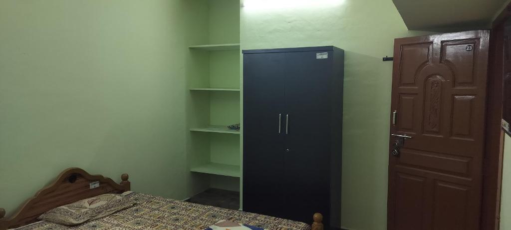 Postel nebo postele na pokoji v ubytování Vikistays