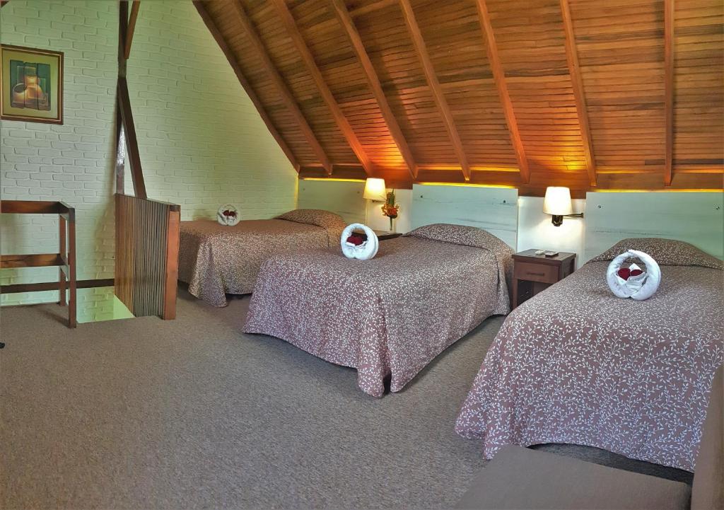 Postel nebo postele na pokoji v ubytování Hotel Balandra
