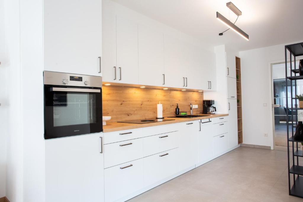 Kuchyň nebo kuchyňský kout v ubytování Siebenschläfer Appartements