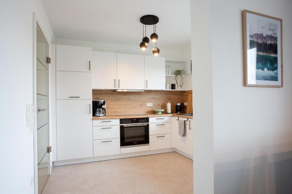 Kuchyň nebo kuchyňský kout v ubytování Siebenschläfer Appartements