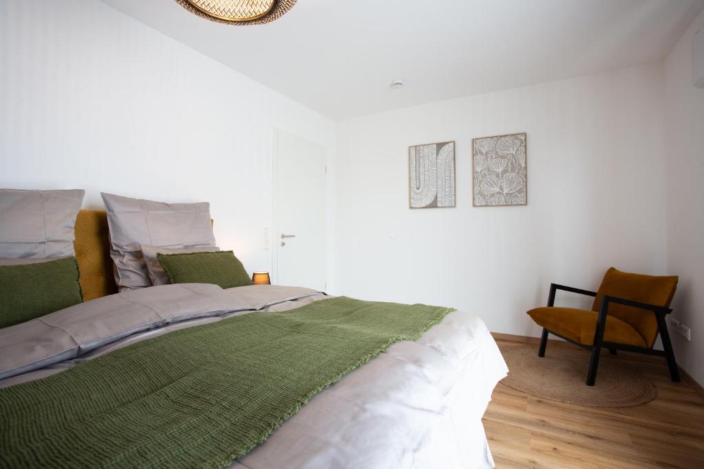 Postel nebo postele na pokoji v ubytování Siebenschläfer Appartements