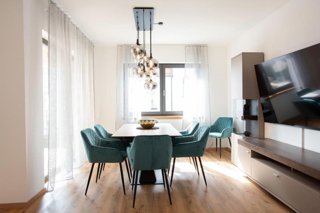 TV a/nebo společenská místnost v ubytování Siebenschläfer Appartements