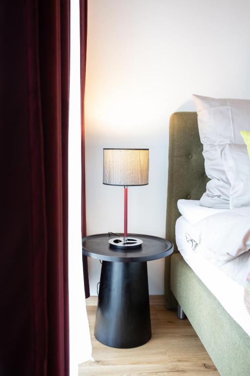 Postel nebo postele na pokoji v ubytování Siebenschläfer Appartements
