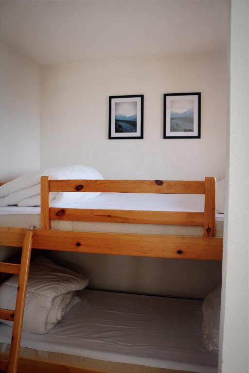 Postel nebo postele na pokoji v ubytování Charmant Appartement Les temples du Soleil