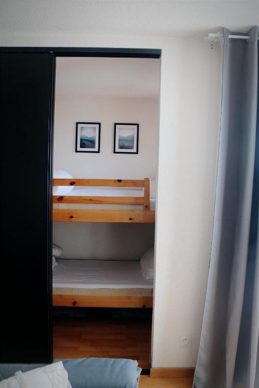 Postel nebo postele na pokoji v ubytování Charmant Appartement Les temples du Soleil