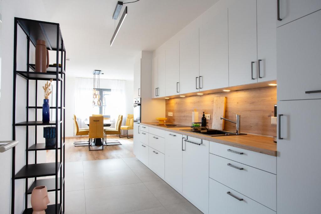 Kuchyň nebo kuchyňský kout v ubytování Siebenschläfer Appartements