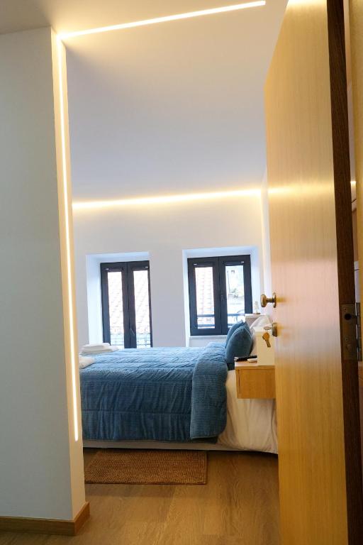Postel nebo postele na pokoji v ubytování CASA ORIGENS ll