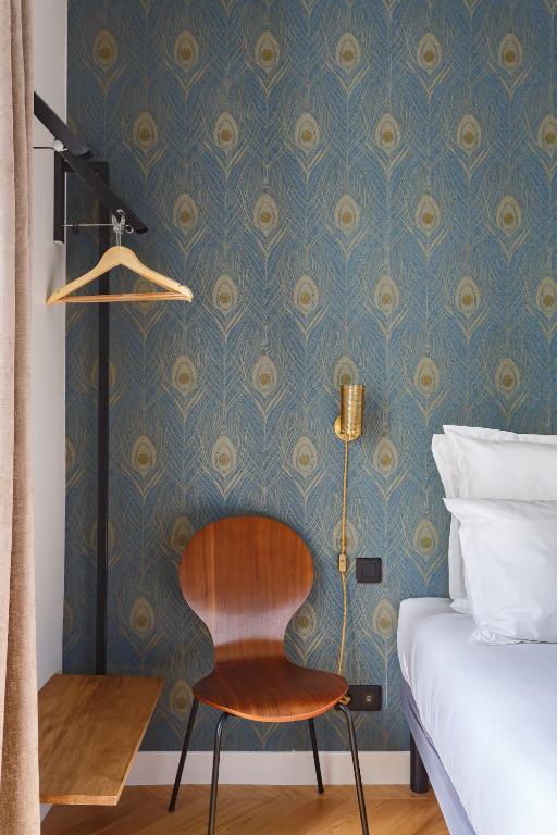 Un ou plusieurs lits dans un hébergement de l'établissement Stylish apartment in the heart of Paris