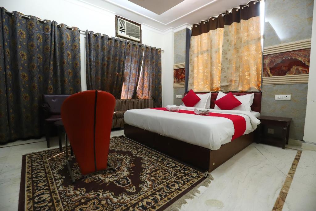Postel nebo postele na pokoji v ubytování The Hotel Vagmi DLF Gurugram