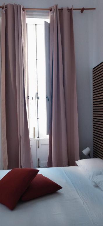 Postel nebo postele na pokoji v ubytování Suite Tati