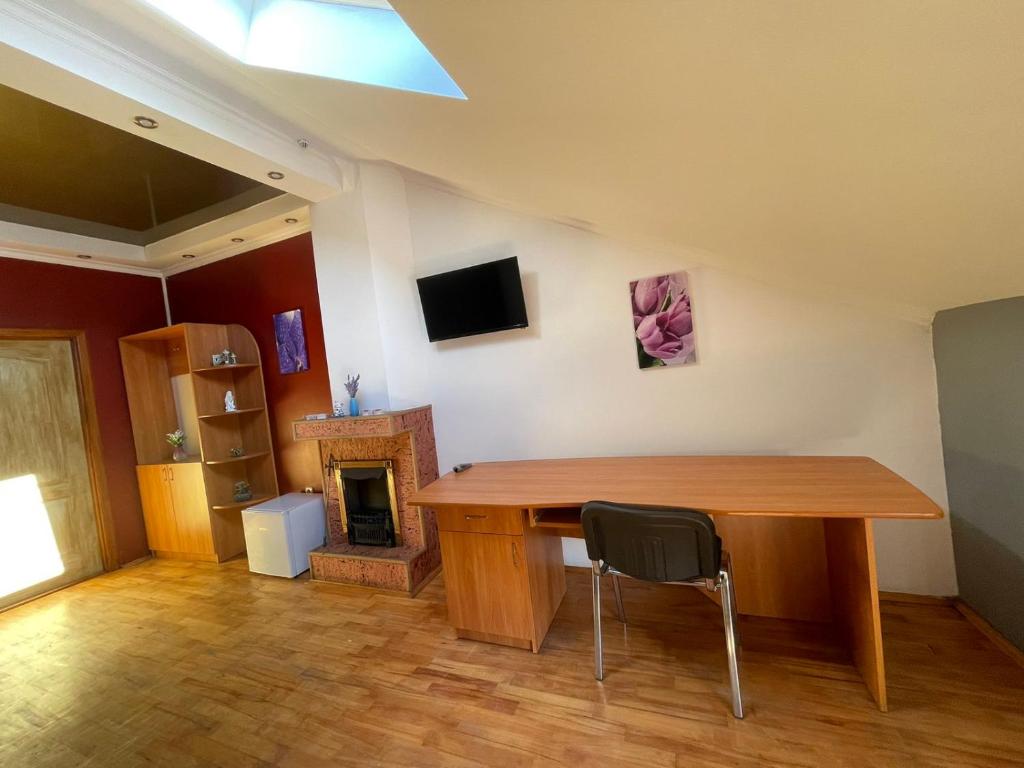 TV a/nebo společenská místnost v ubytování Hotel Daniel