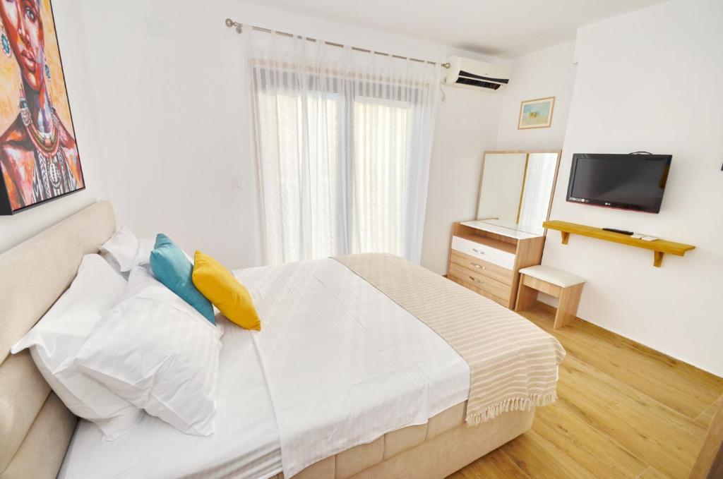 Een bed of bedden in een kamer bij DC Apartment C