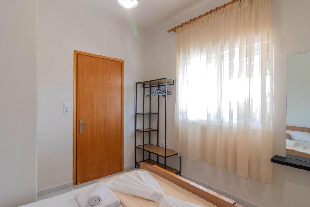 Postel nebo postele na pokoji v ubytování Beachside Apartment-2