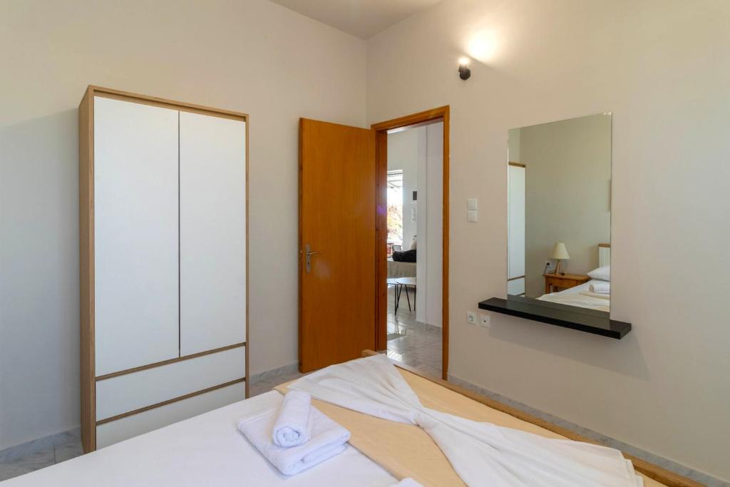 Postel nebo postele na pokoji v ubytování Beachside Apartment-2