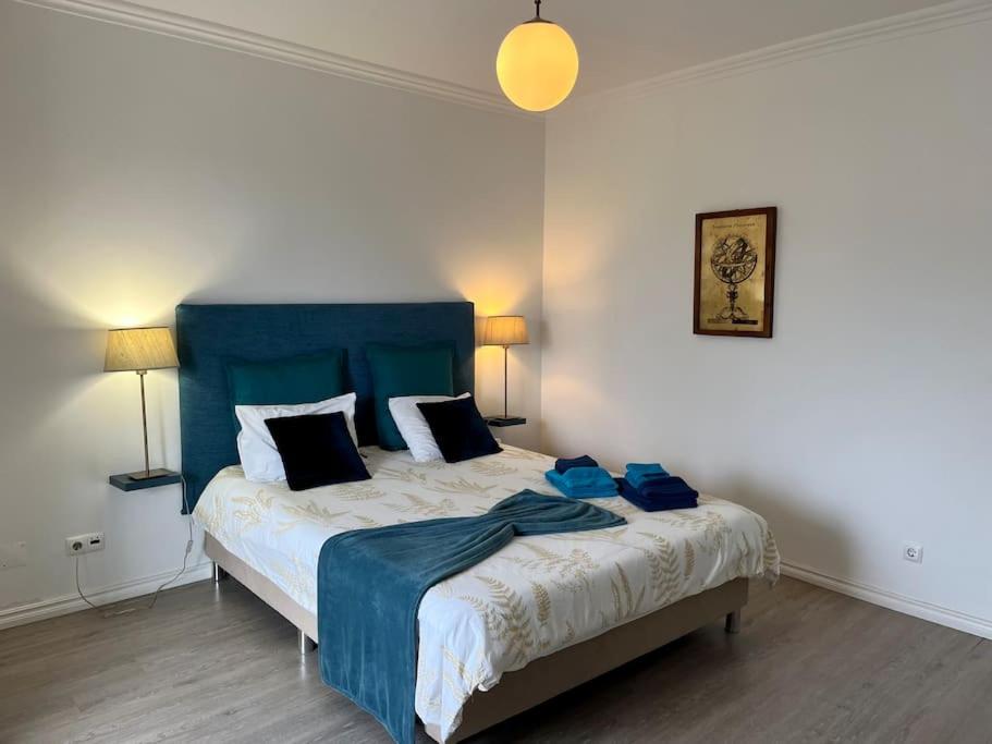 Ένα ή περισσότερα κρεβάτια σε δωμάτιο στο Casa Caloura Water Deluxe Accommodation & Spa