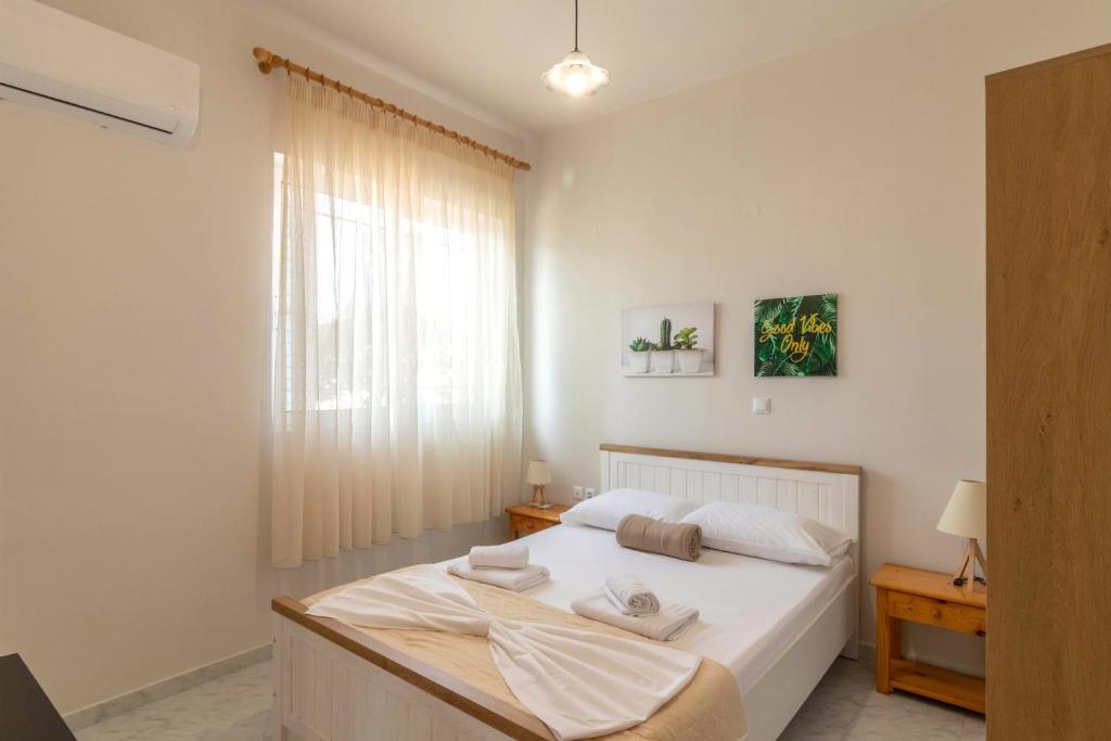 Postel nebo postele na pokoji v ubytování Beachside Apartment-2