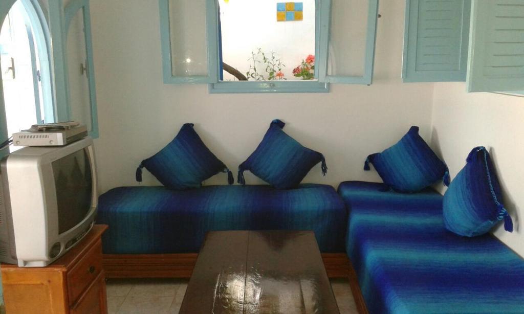 Posezení v ubytování Appart Hôtel La Planque