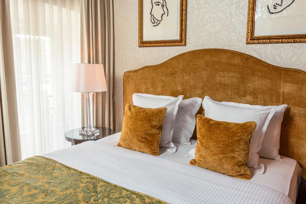 Postel nebo postele na pokoji v ubytování Grand Hotel Casselbergh