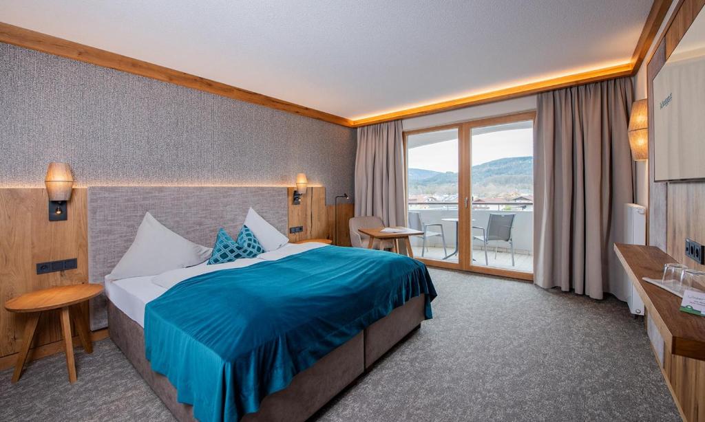 Postel nebo postele na pokoji v ubytování Hotel Königgut