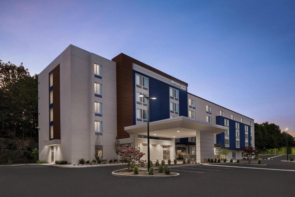 a rendering of a building in a parking lot at SpringHill Suites by Marriott Tuckahoe Westchester County in Tuckahoe