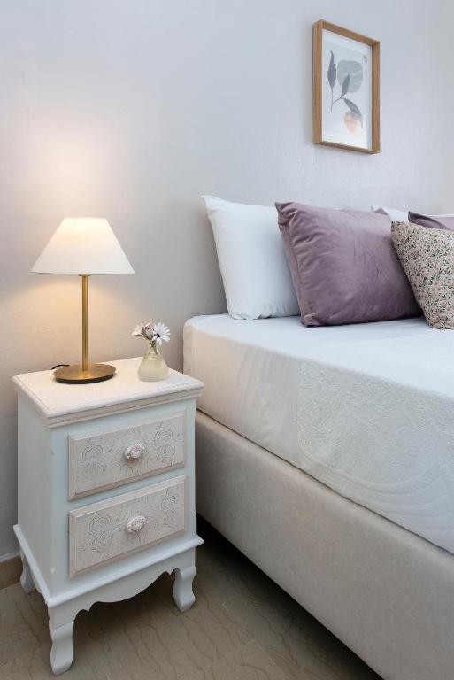 Postel nebo postele na pokoji v ubytování NiSea Apartments