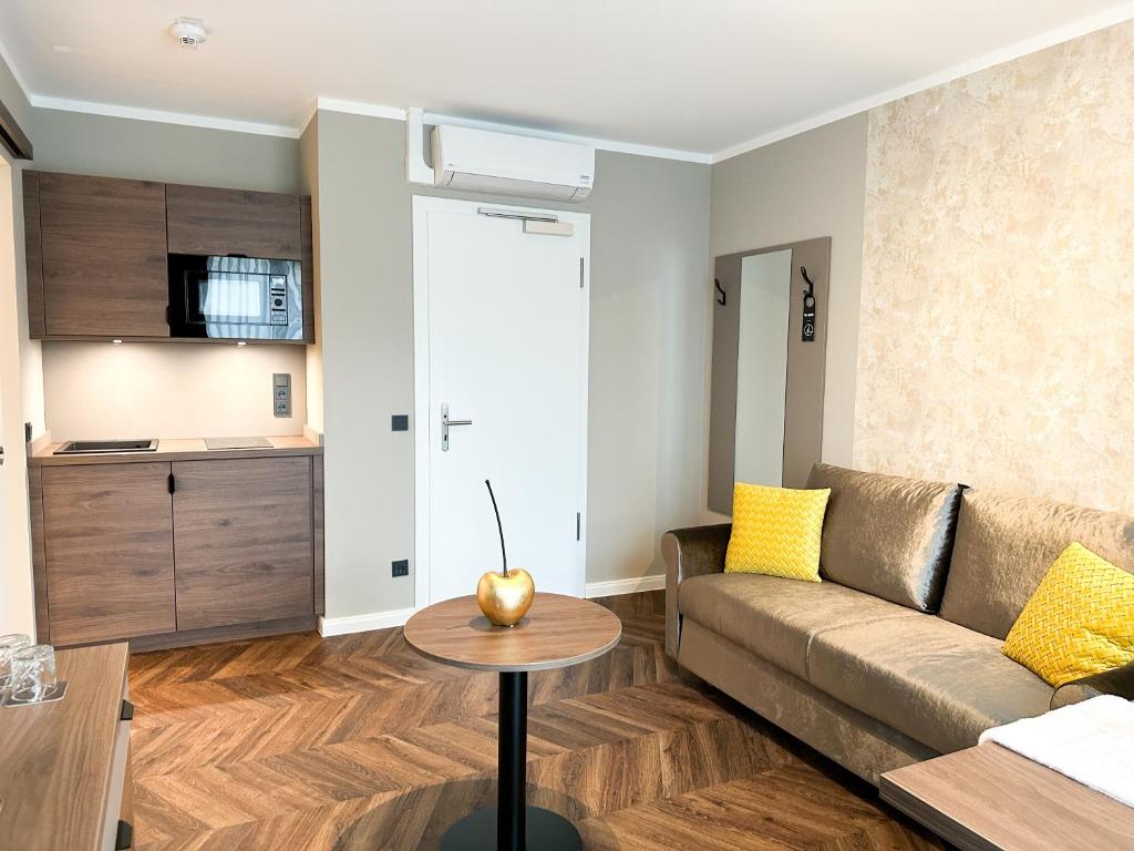 TV a/nebo společenská místnost v ubytování Hotel Restaurant Hackmann-Atter